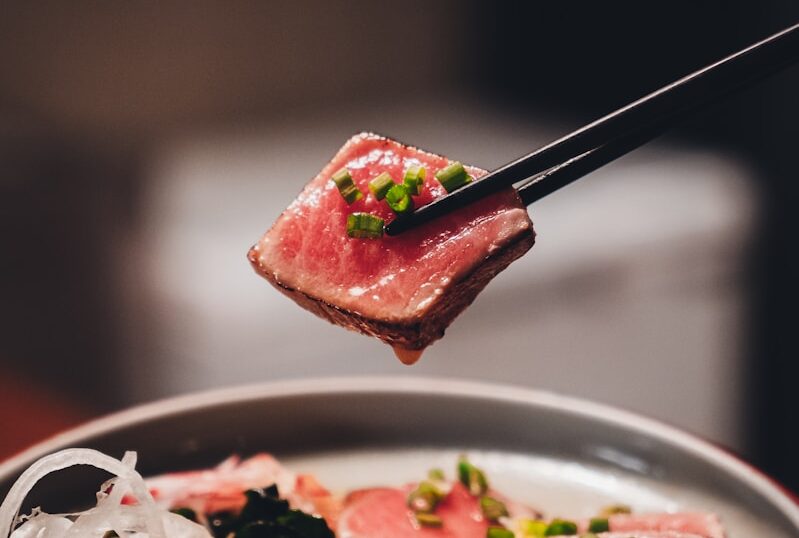 stainless steel fork on white ceramic plate