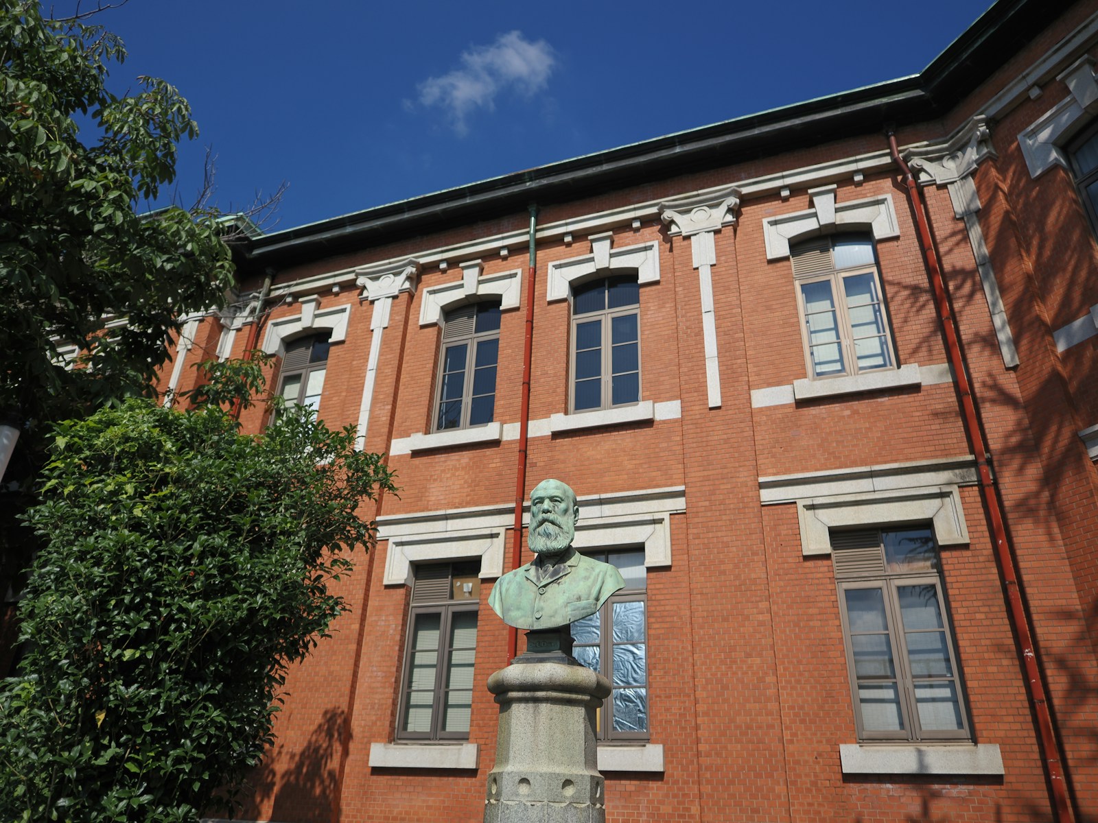 A building with a statue in front of it
