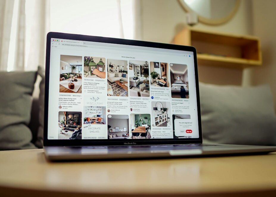 black ipad on brown wooden table